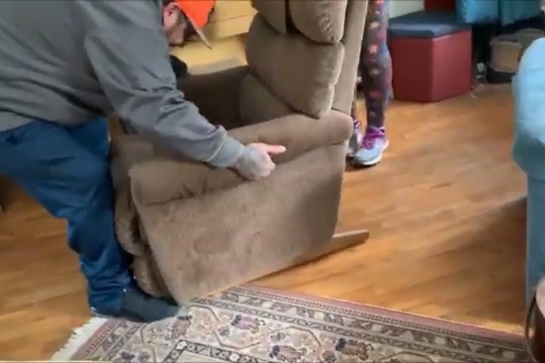 Lifting a recliner clear of the floor